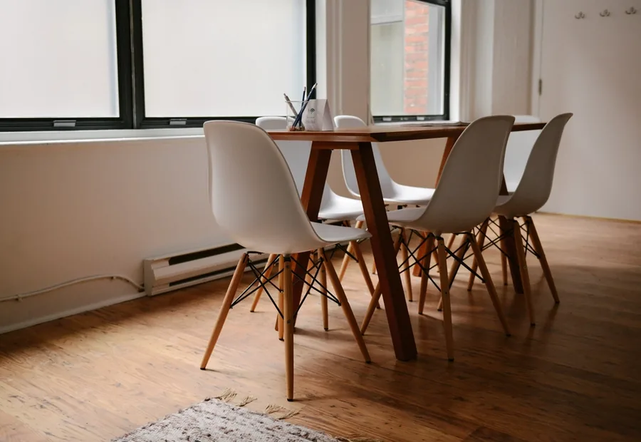 Modern meeting room with a bright table and chairs